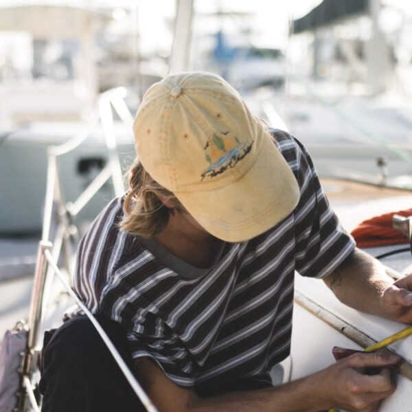 man-is-writing-paper-with-boat-background